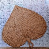 Heart fan in vintage woven palm leaves