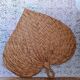 Heart fan in vintage woven palm leaves