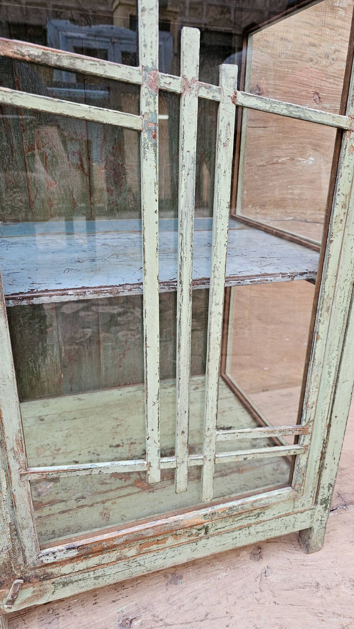 Art Deco glass-fronted bar cabinet in teak