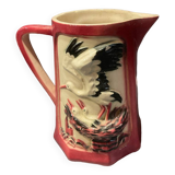 Set of stork pitchers