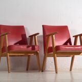 2 red armchairs, circa 1960