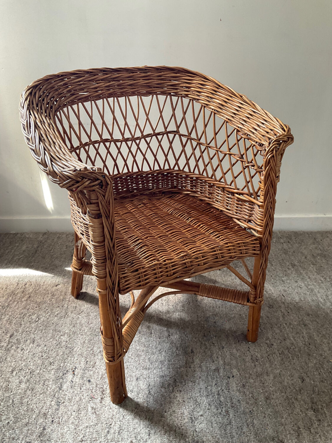 Vintage wicker children's armchair