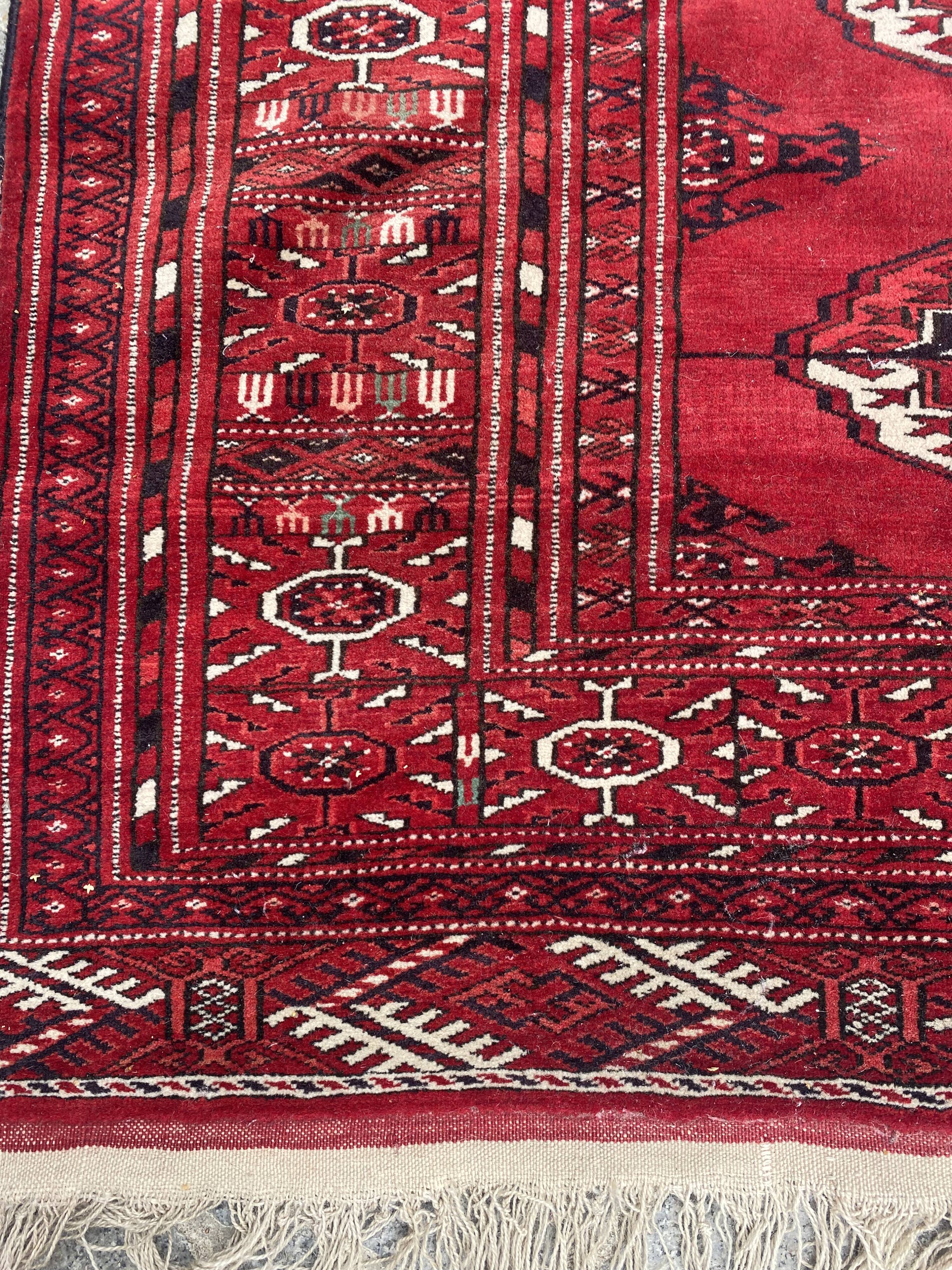 Nice big vintage carpet Bokhara handmade 200x282 cm