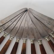 Twelve knives, horn handle, steel blade signed Philip CADET Marseille