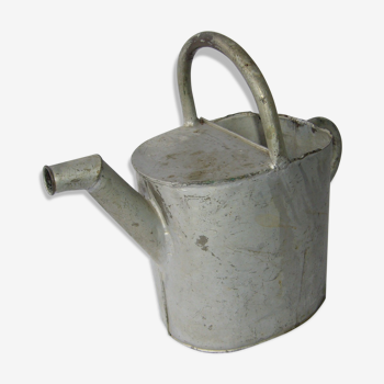 Old zinc watering can