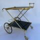 Vintage 1960's bar rolling table smoked glass gilded metal