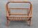 Vintage rattan magazine rack from the 60s