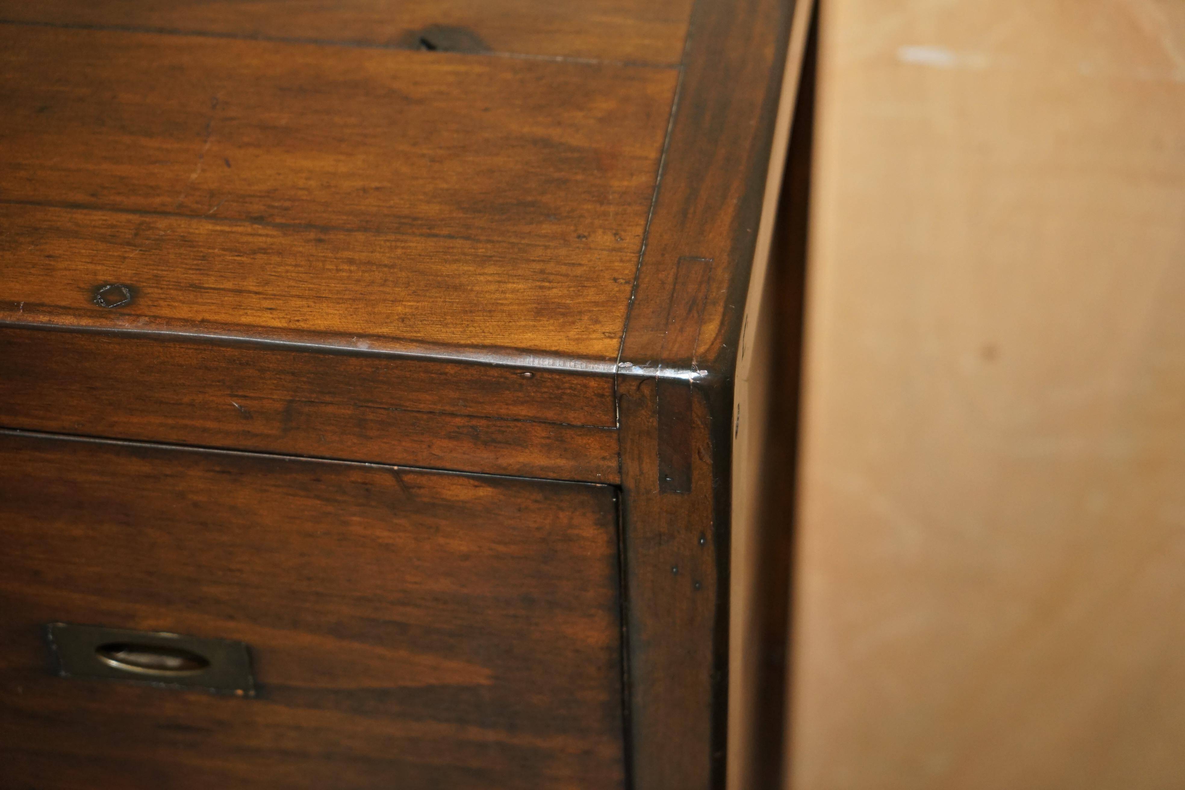 Large vintage hardwood furniture in military country style.