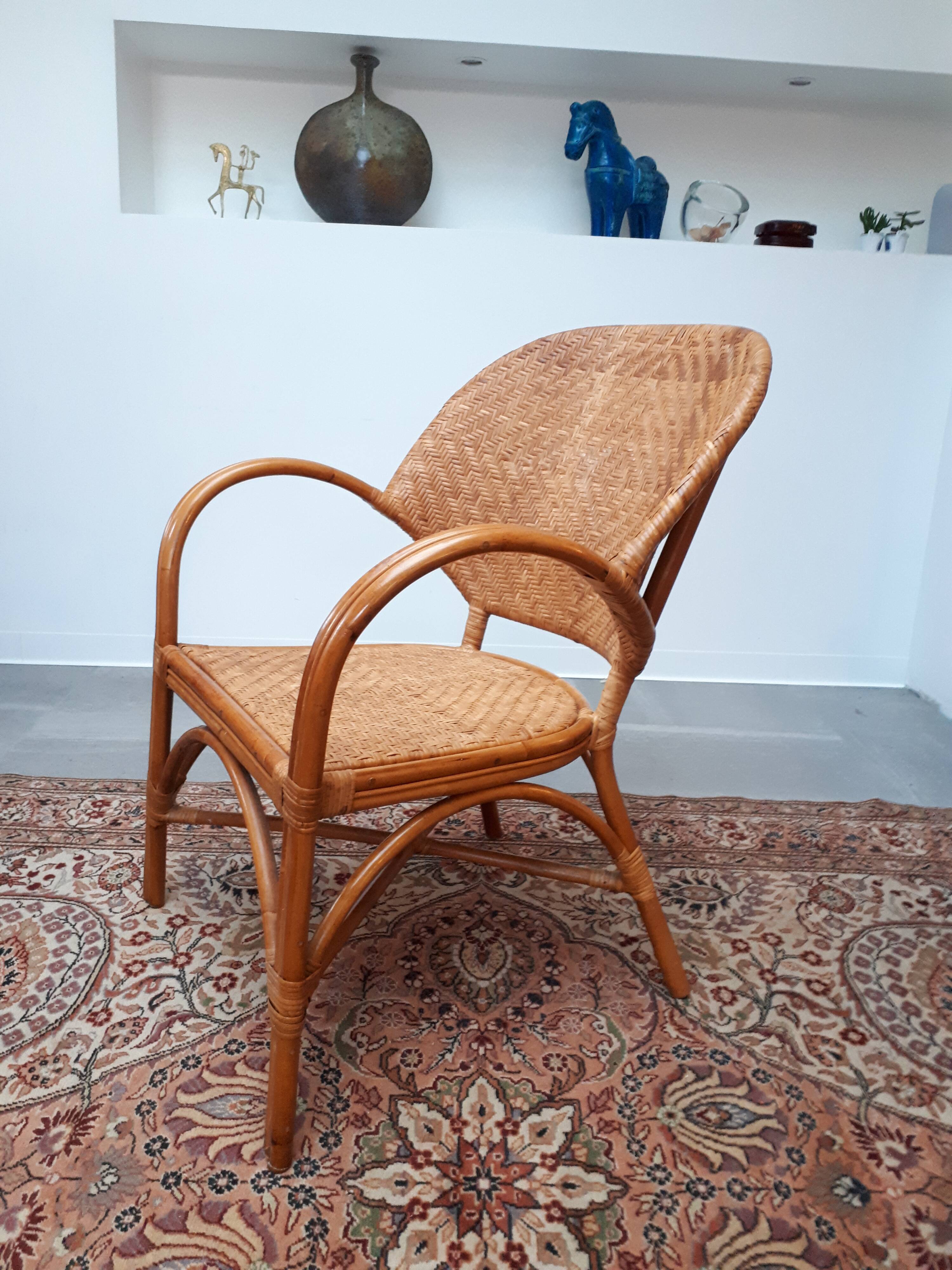 Pair of armchairs in braided rattan 70s