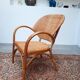 Pair of armchairs in braided rattan 70s