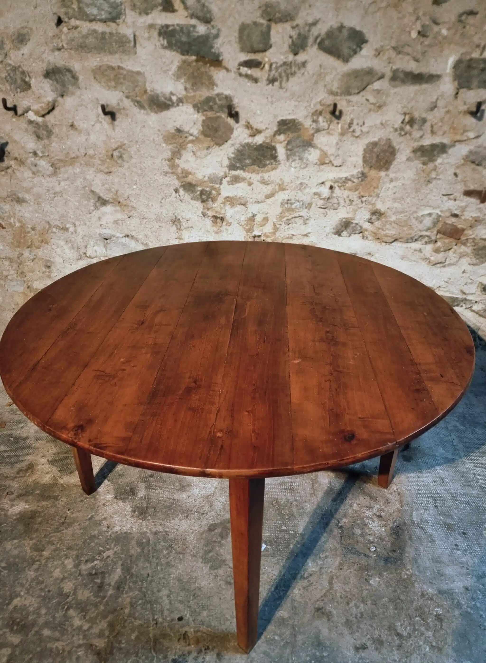 Vintage French round dining table in cherry wood, circa 1920.