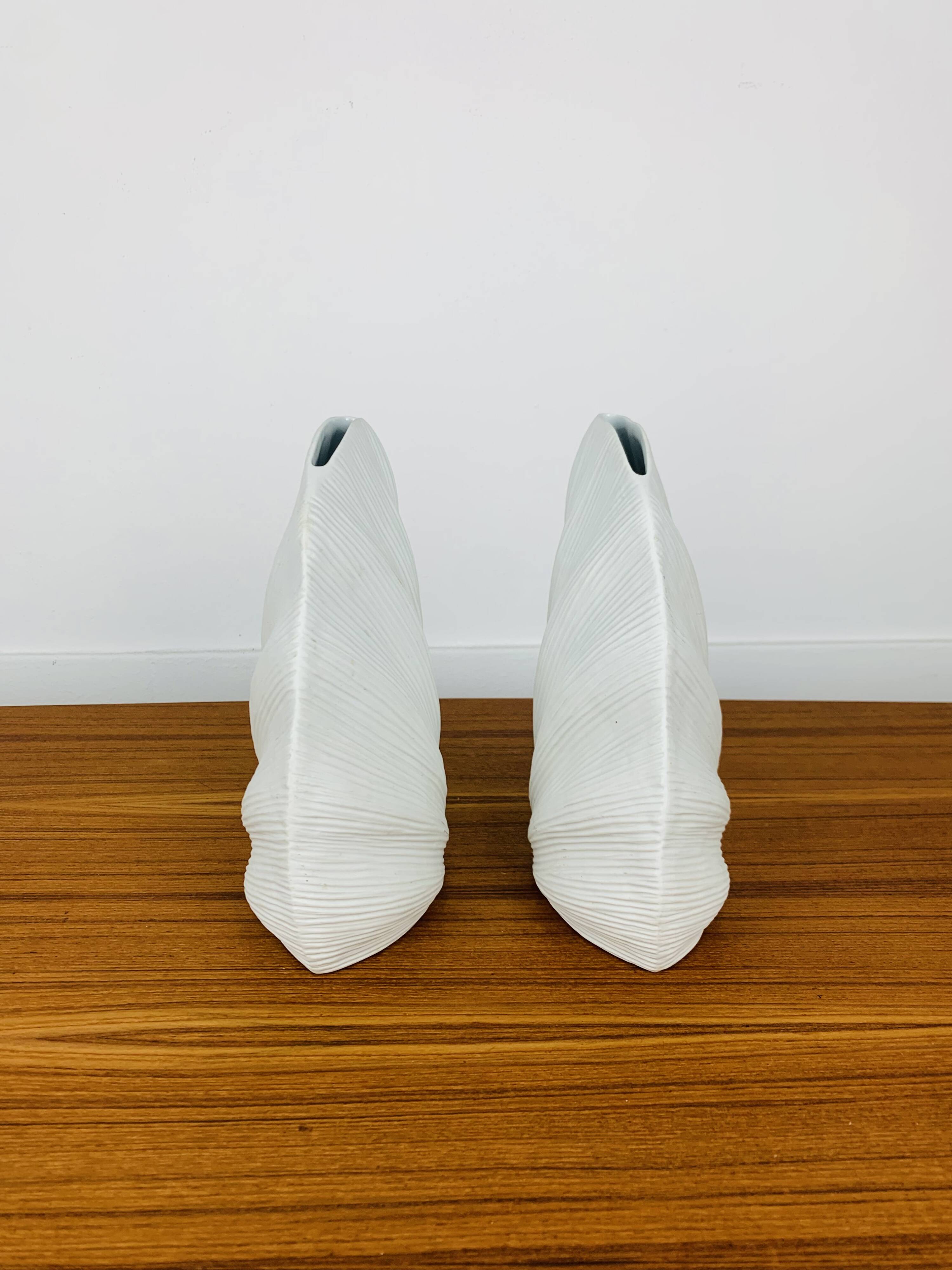 Pair of white ceramic coral vases, bookends