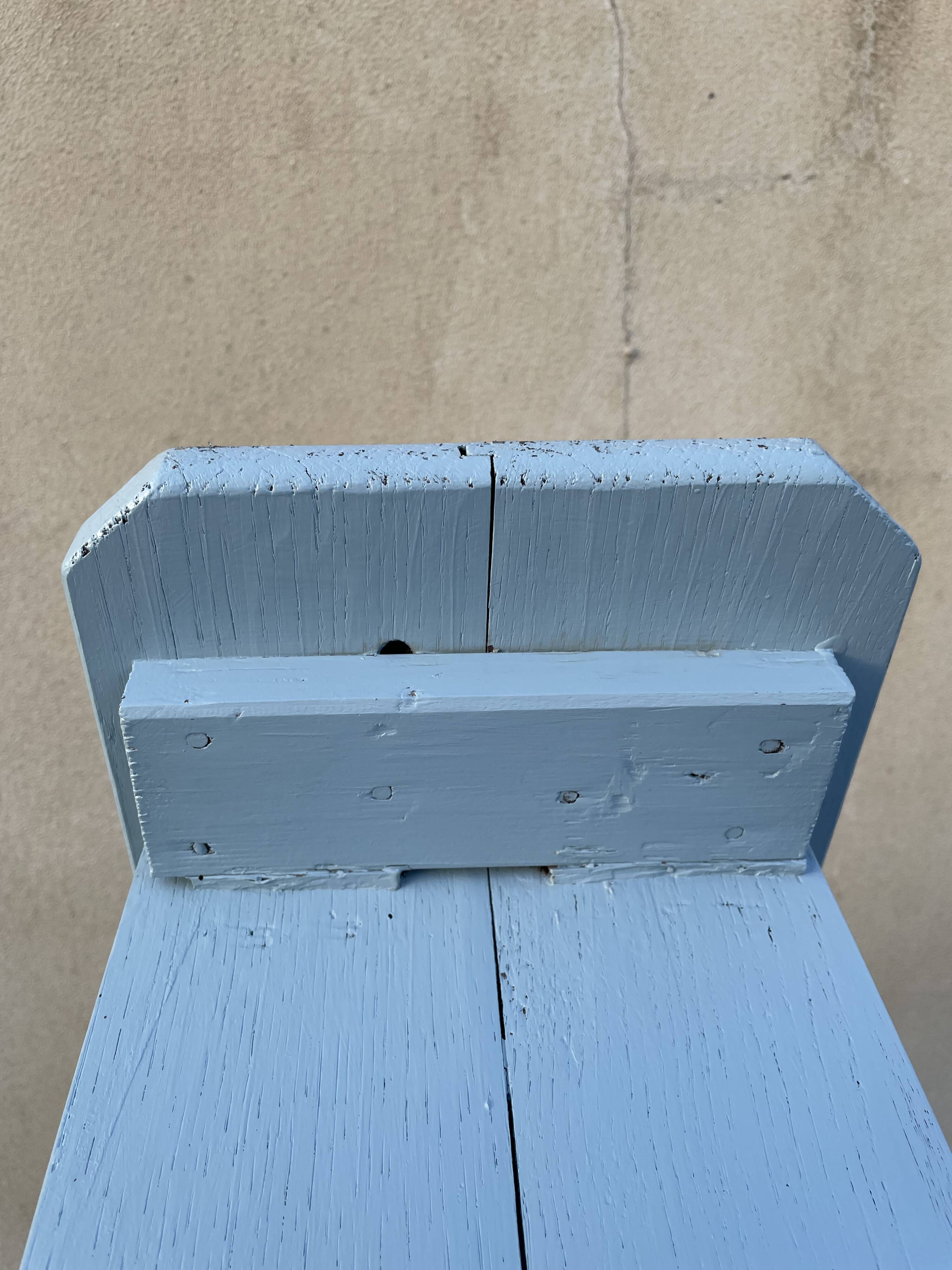 Blue painted wooden bench