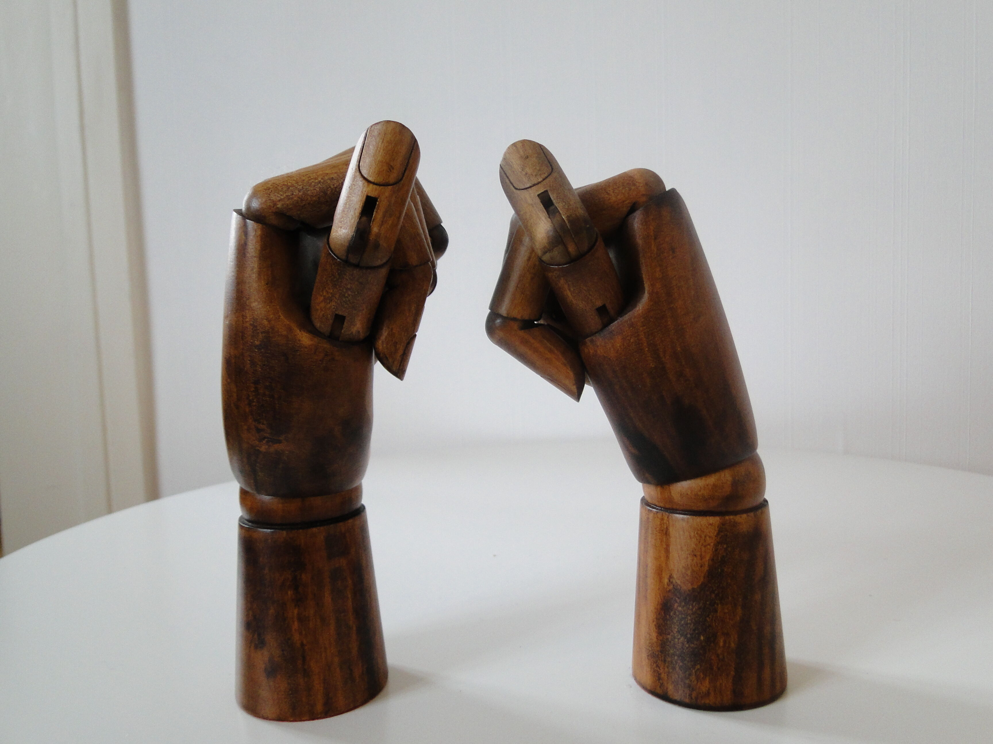 Pair of articulated wooden hands