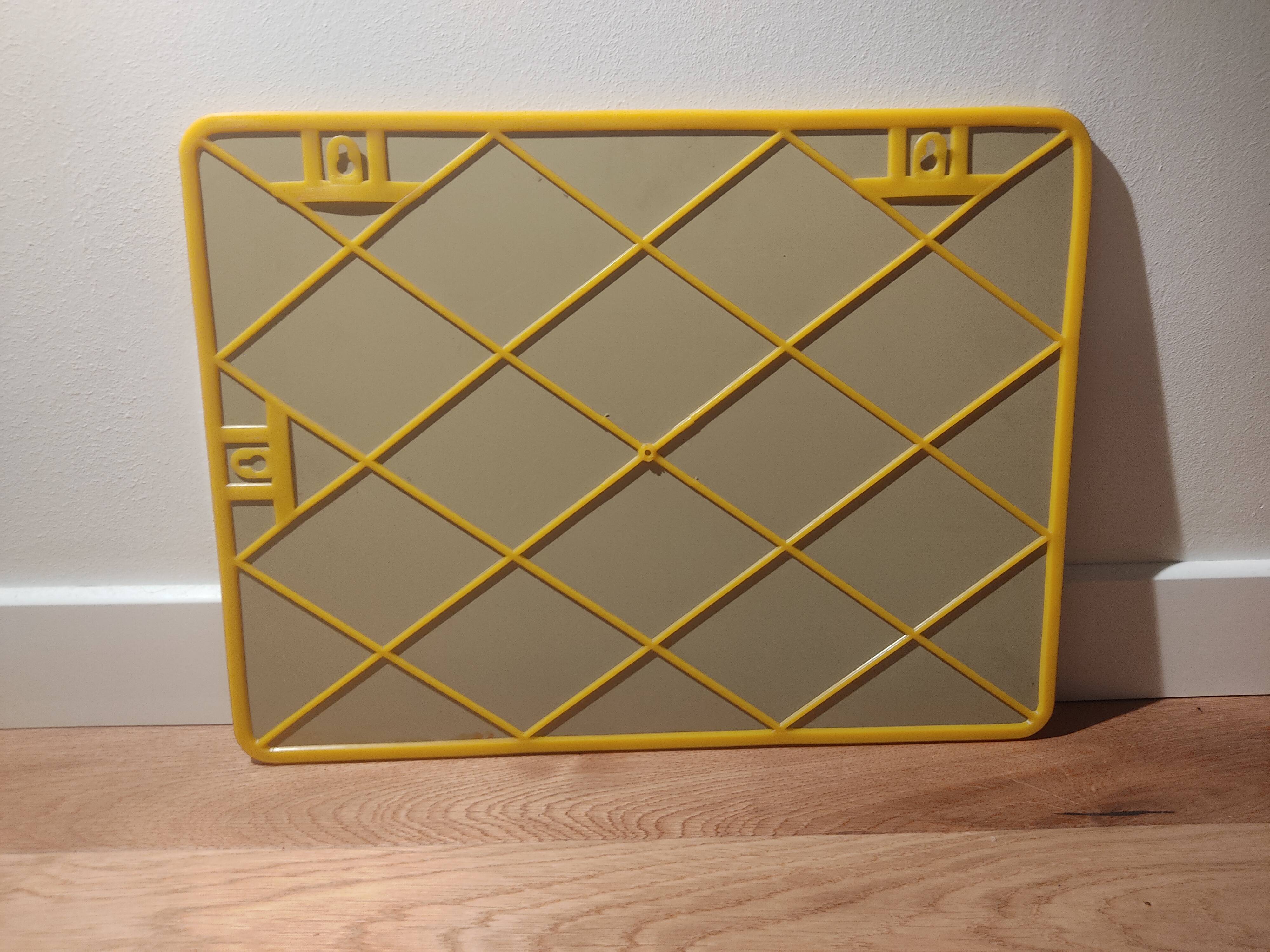 Mirror 70s yellow plastic rounded shape