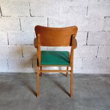 Fauteuil vintage en skai et bois années 60