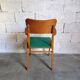 Vintage armchair in skai and wood 60s