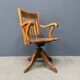 Antique American oak office chair with armrests 1920s