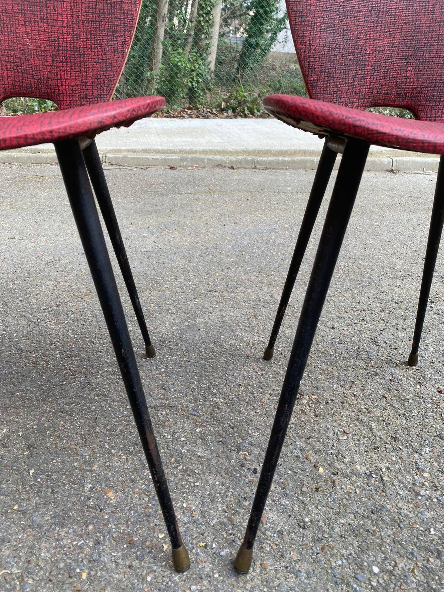 2 petal chairs in burgundy red skai leather and black metal 1950 Sery