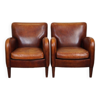 Set of 2 subtle sheepskin leather armchairs with a beautiful warm color scheme