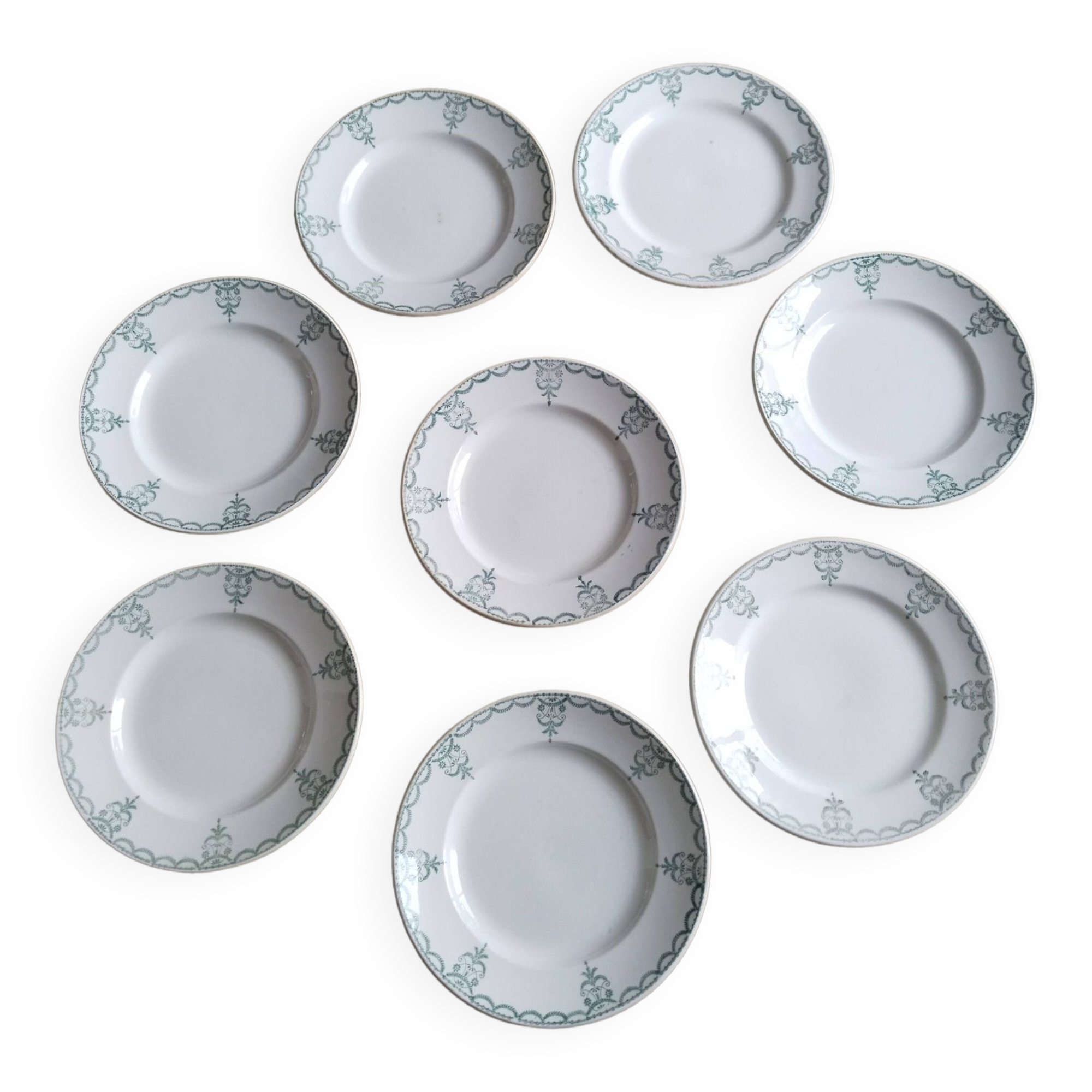 Set of 8 Moulin des Loups earthenware dinner plates, Garlands
