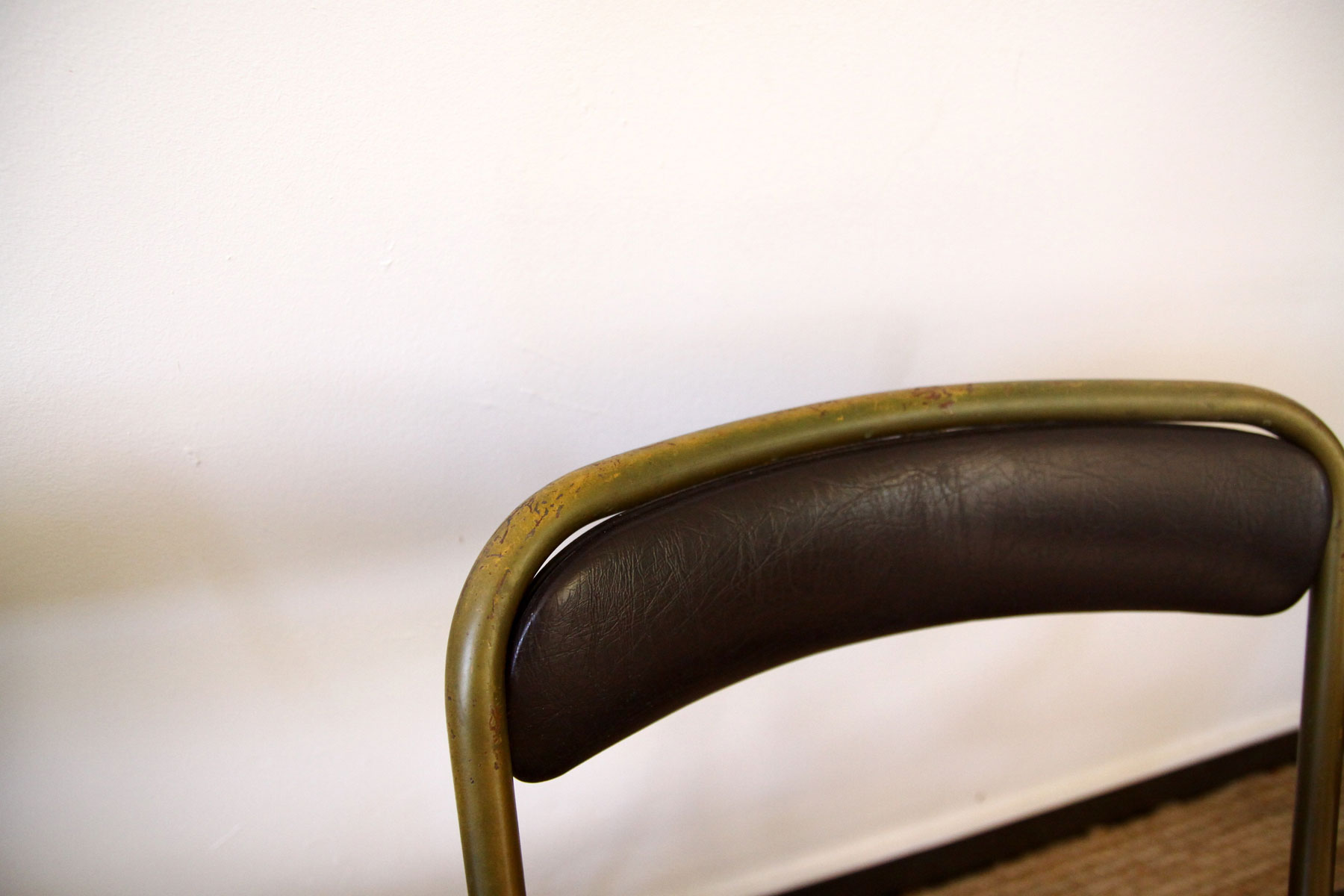 Lot of 4 metal and skai folding chairs