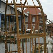 Garden arch with wrought iron gate