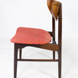 Set of four dining room chairs in rosewood and upholstered with red fabric, of danish design, 1960s