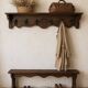 Large antique wall-mounted coat rack in carved wood 135 cm