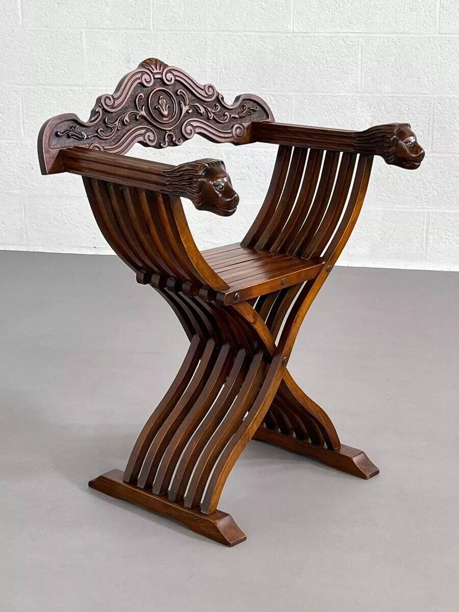 Vintage folding chair in carved wood
