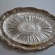 Silver-plated metal aperitif serving tray with HKE hallmark and glass.