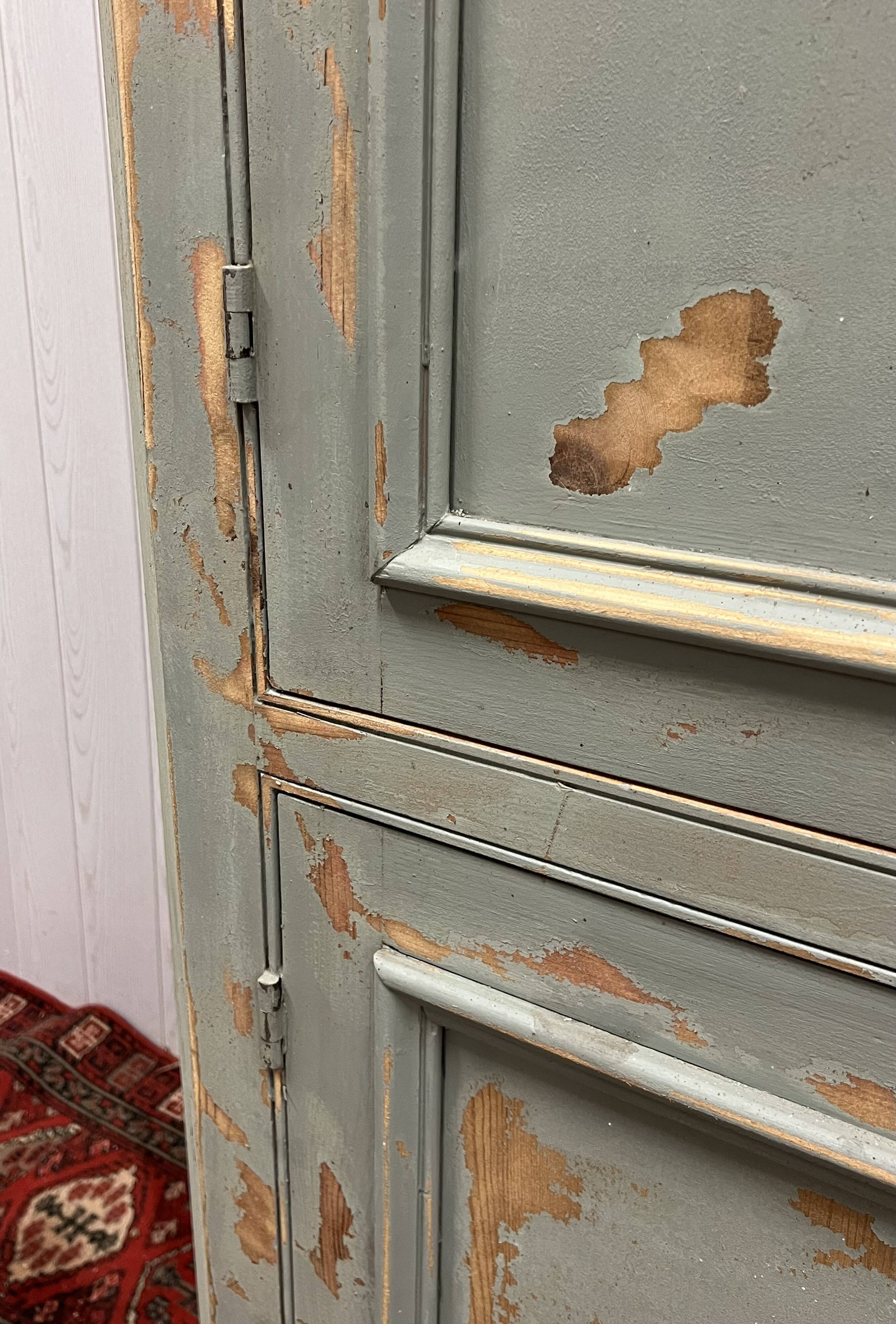 Patinated corner cupboard