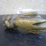 Hand-shaped door knocker
