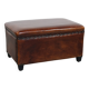 Cognac-colored sheepskin stool with decorative studs