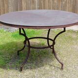Garden table with wrought iron base