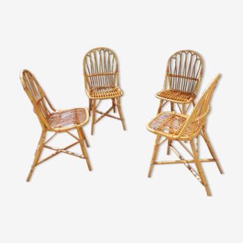 Series of 4 vintage rattan chairs.