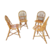 Series of 4 vintage rattan chairs.
