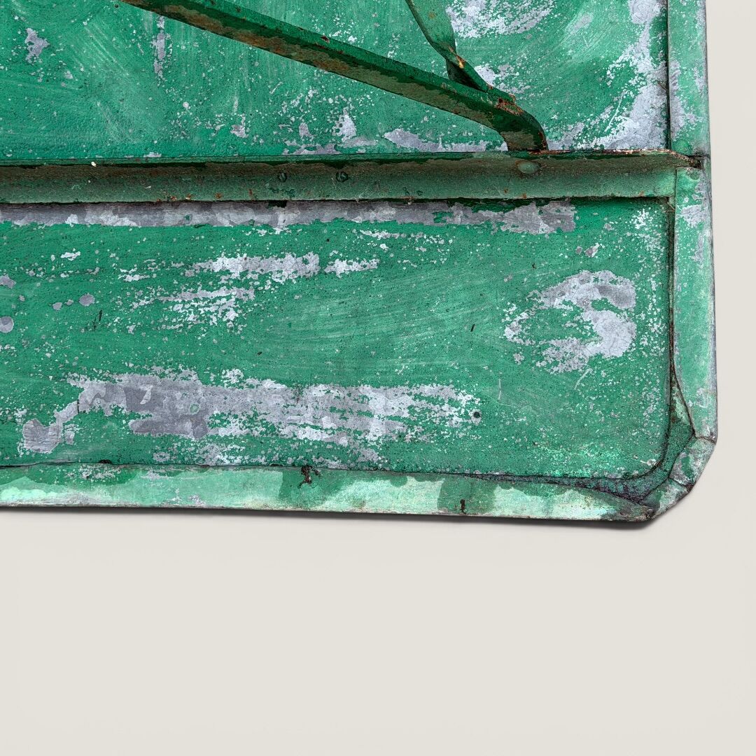 Bistro tables and folding chairs with a patina from the original 1930s.