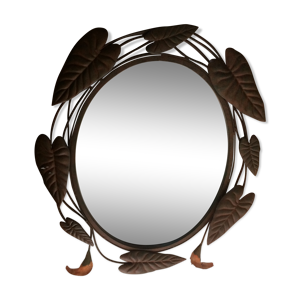 Miroir ovale entourage fer forgé en forme de fleurs et feuillage noir 69x55cm