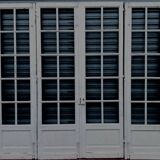 Suite de quatre portes de passage a petits carreaux XX siècle