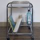 Stainless steel magazine holder side table