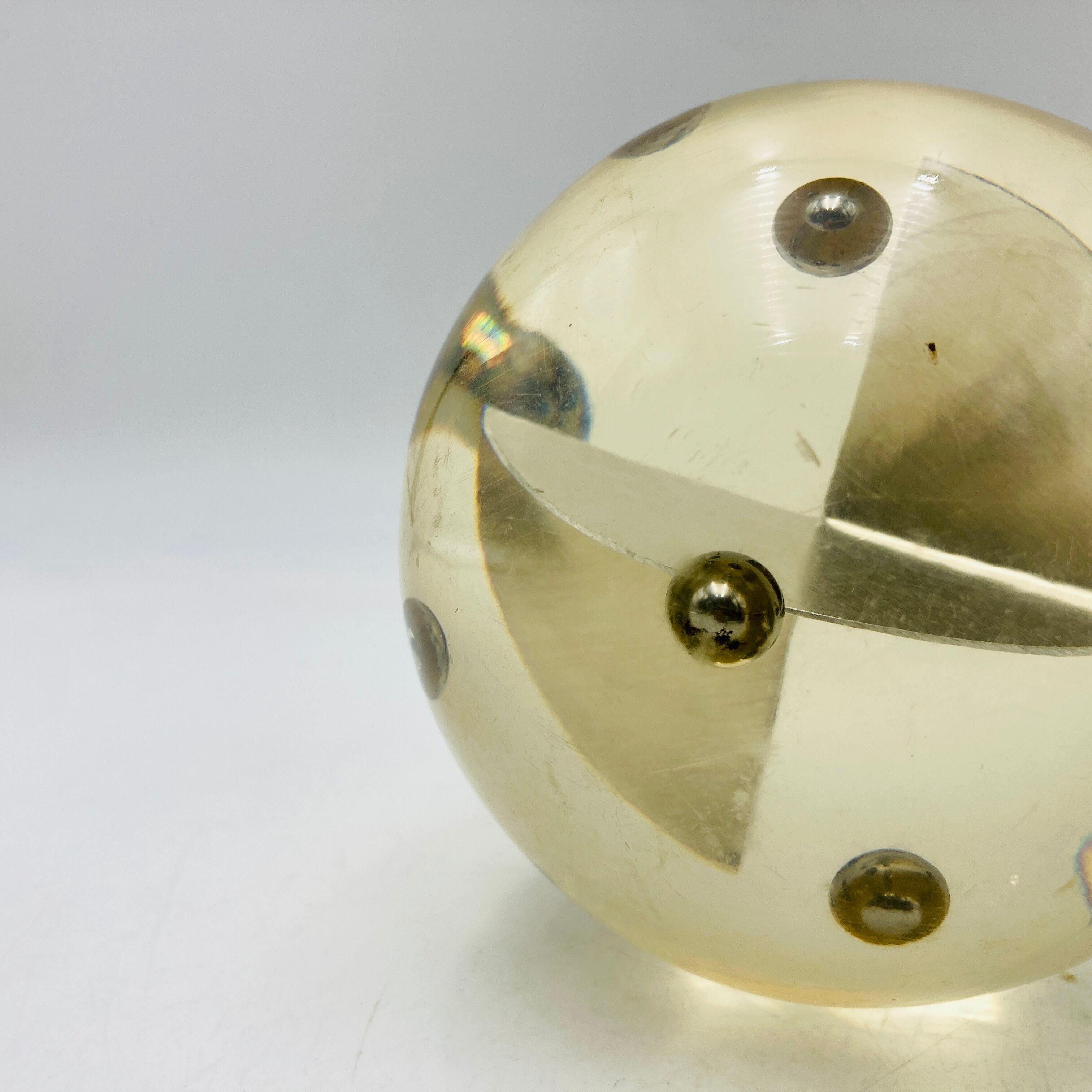 Paper press ball shape, resin with inclusions, 70s