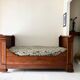 Cherry wood boat bed with bedding