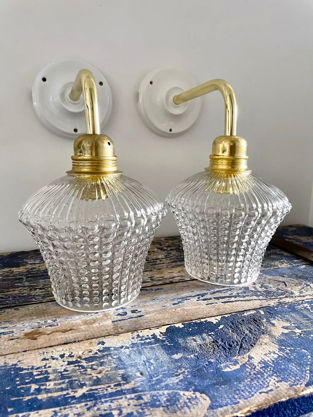 Pair of vintage electrified glass wall lamps