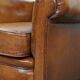 Cognac-colored antique sheep leather armchair