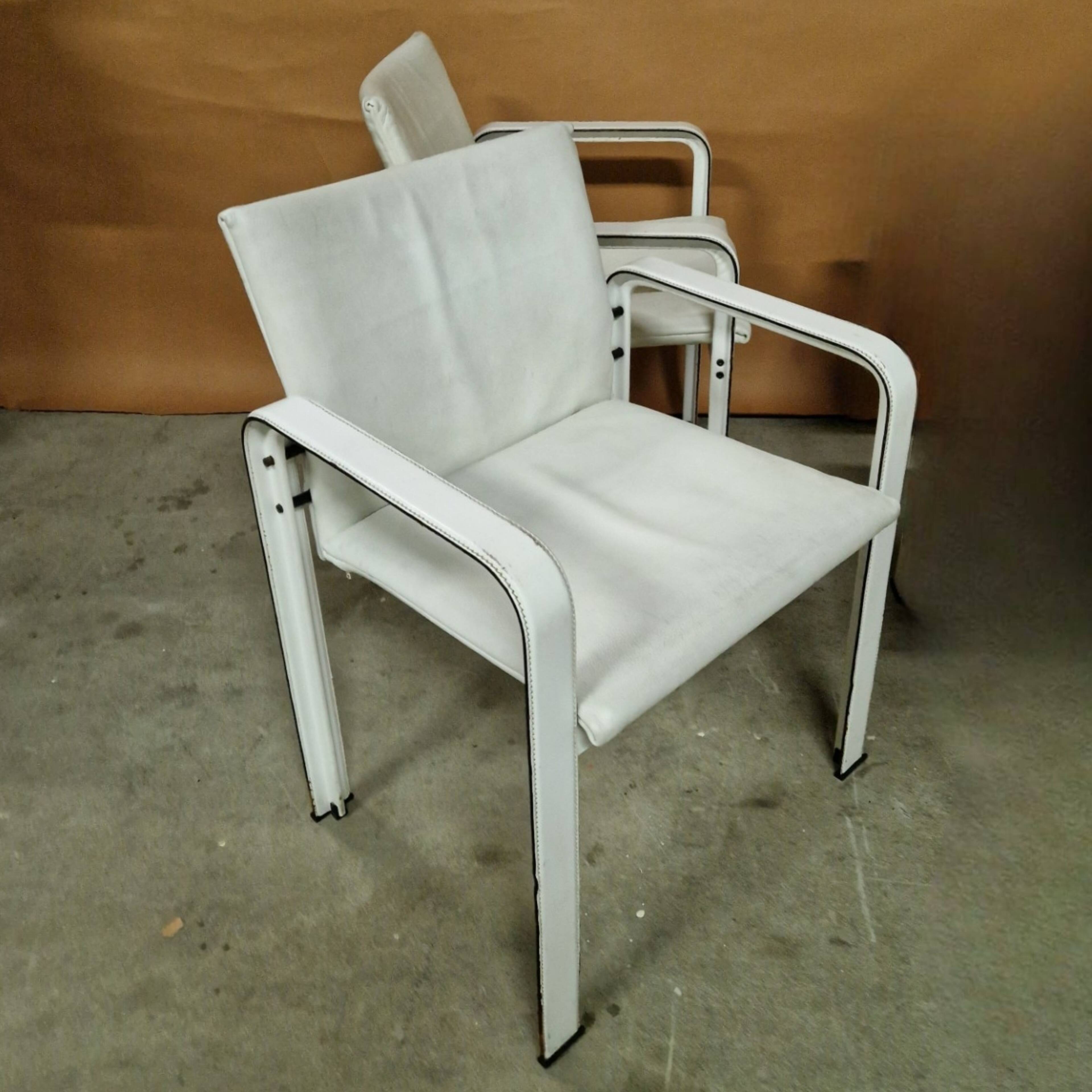 Set of 4 leather dining chairs by Jacques Toussaint and Patrizia Angeloni for Matteo Grassi. Italy 1