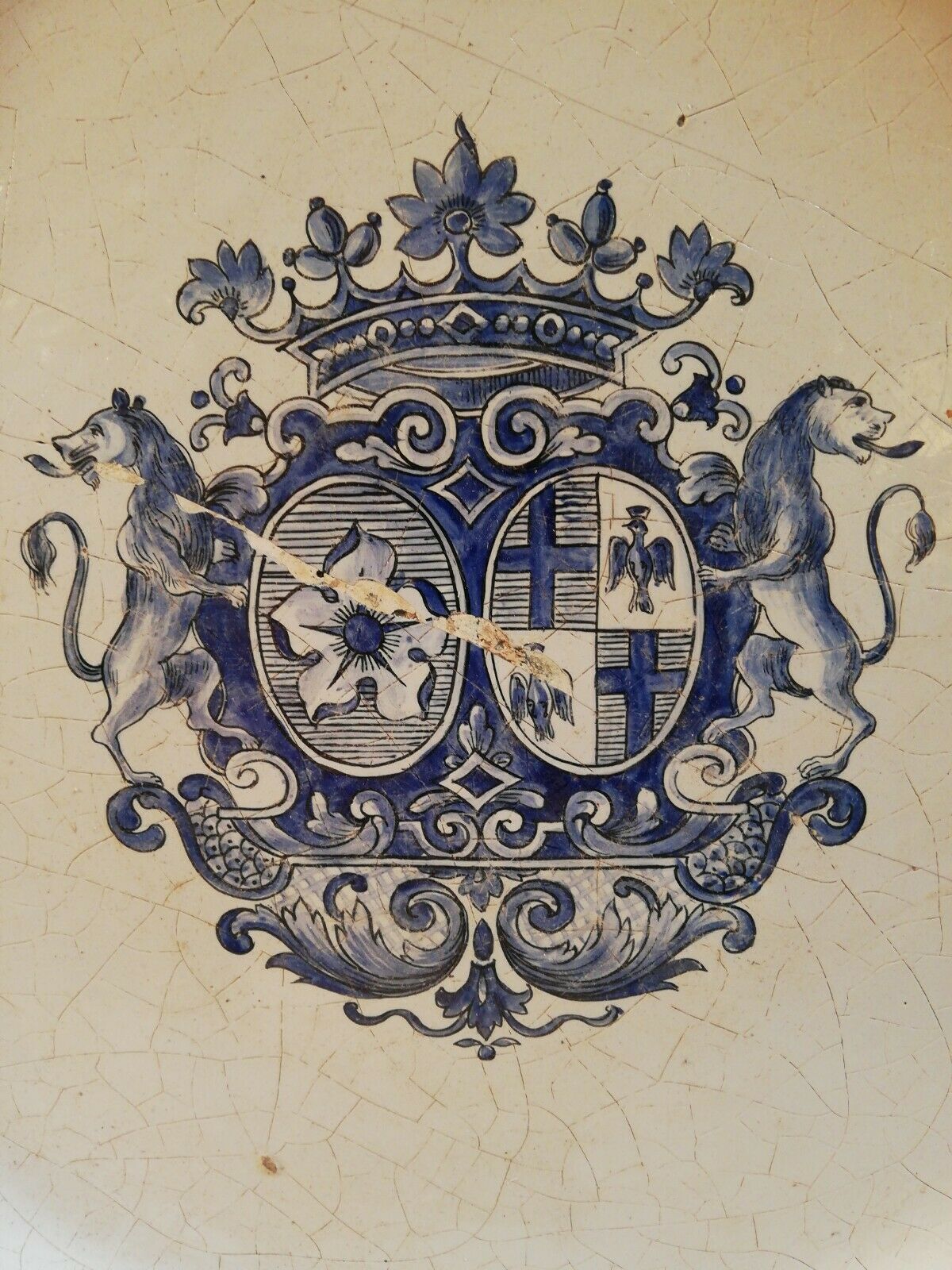 Rouen earthenware dish decorated coat of arms