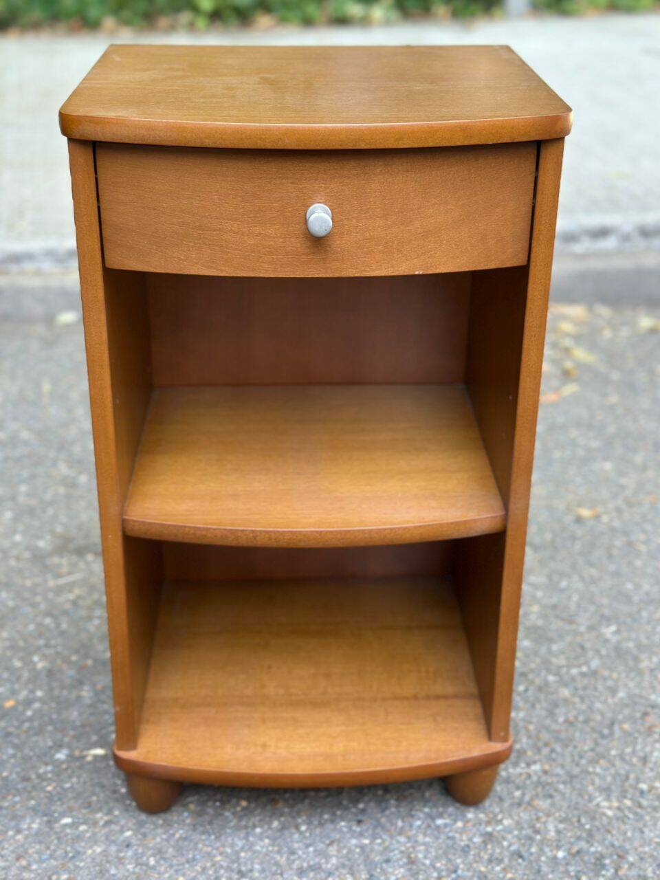 2 contemporary wooden bedside tables from the 2000s.