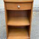 2 contemporary wooden bedside tables from the 2000s.