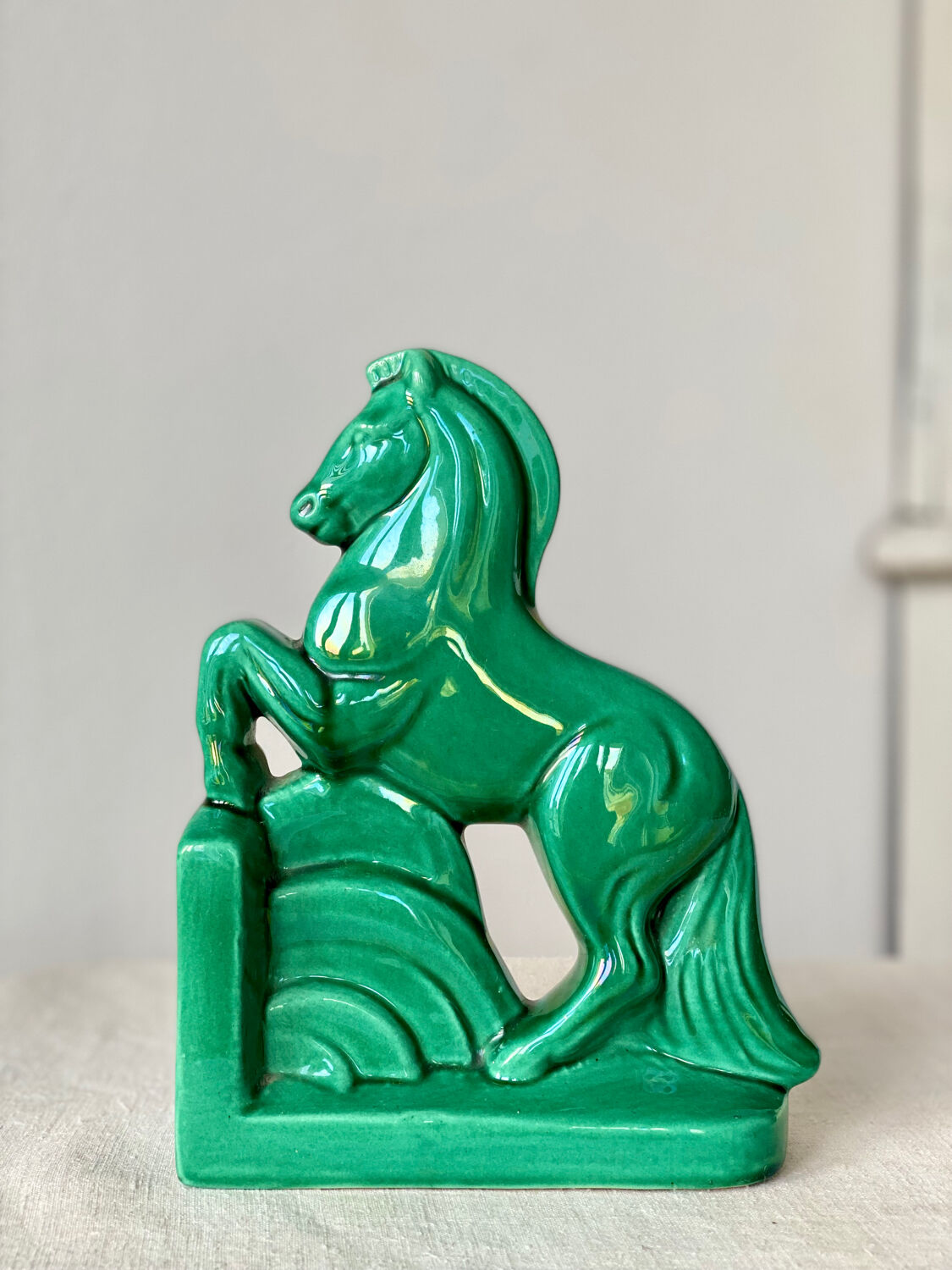 Horse bookend in green ceramic